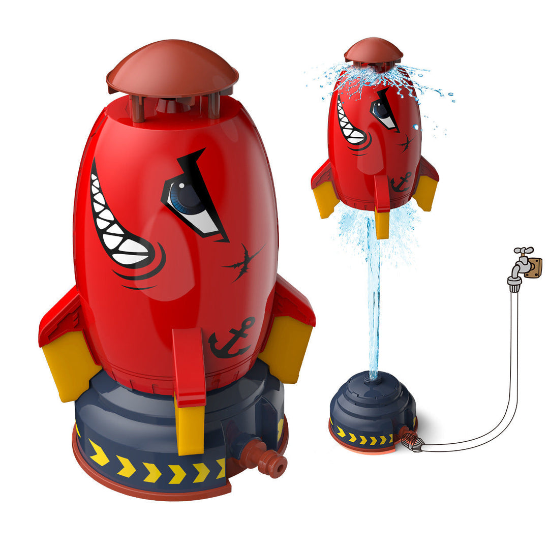 Red rocket sprinkler on its base and lifted by a water jet, with a garden-hose connection shown