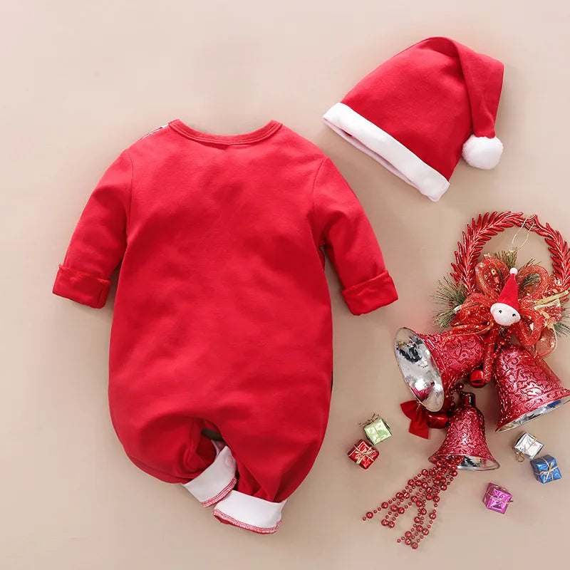 Back view of the red long-sleeve baby romper, shown beside a red Santa hat