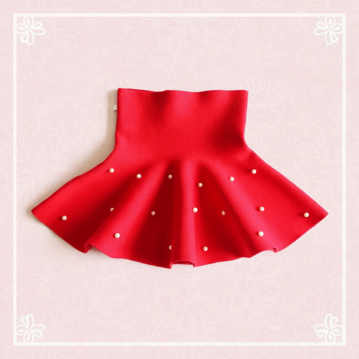 Red flared knit skirt with scattered pearl-style beads