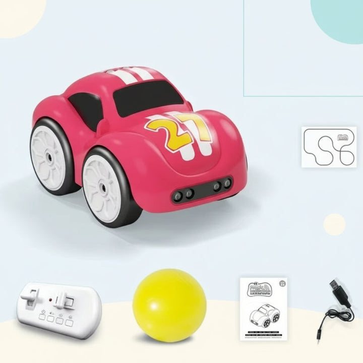 Red sports car with remote controller, yellow ball, charging cable, and instruction booklet
