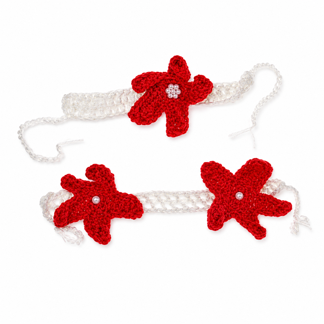Red knitted starfish top and headband with white bands and ties