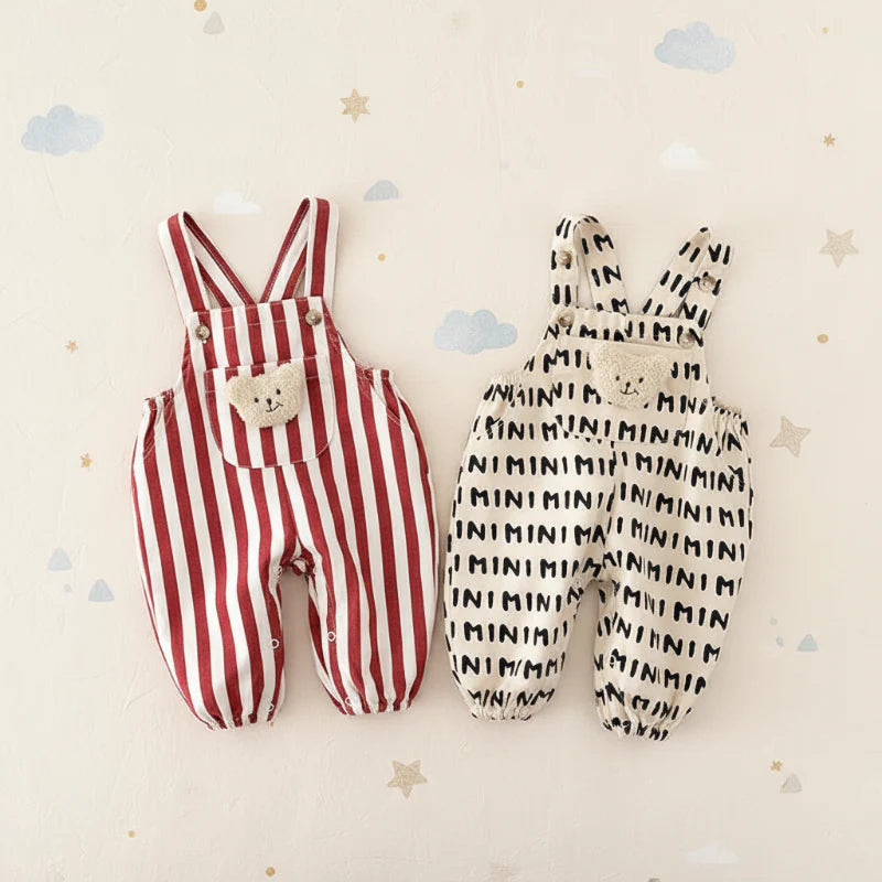 Red striped and beige MINI-print overall rompers laid flat with teddy details on the bibs