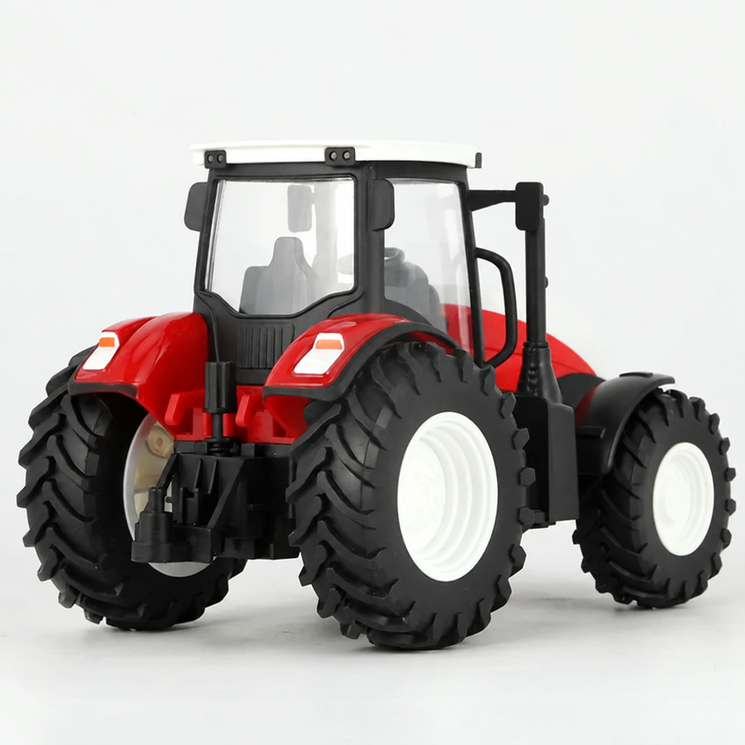 Rear view of the red RC tractor showing the cab, large treaded tires, and rear hitch