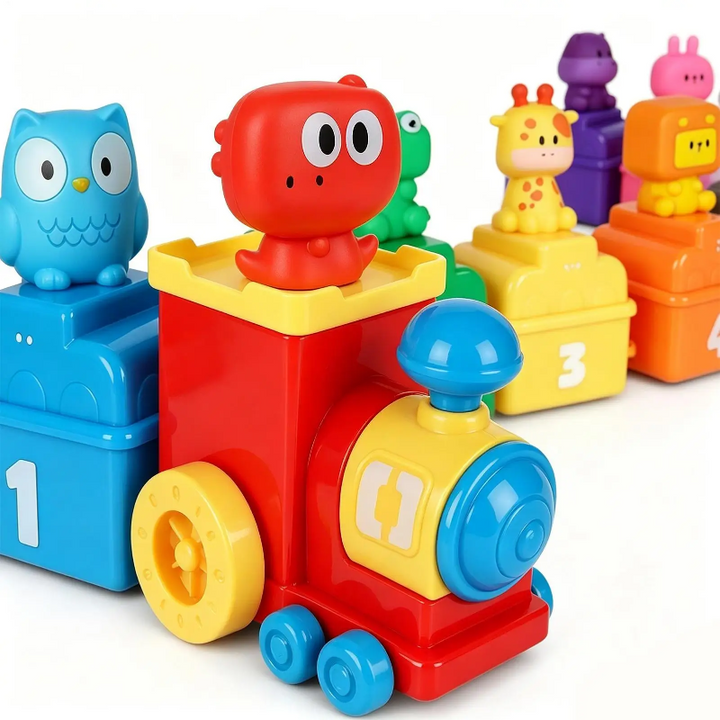 Red toy train engine with a blue owl wagon and other animal-topped cars
