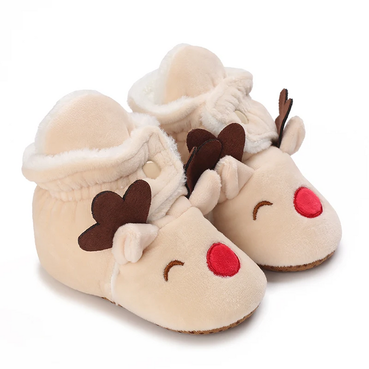 Cream reindeer baby boots with brown antlers, red noses and plush-lined openings