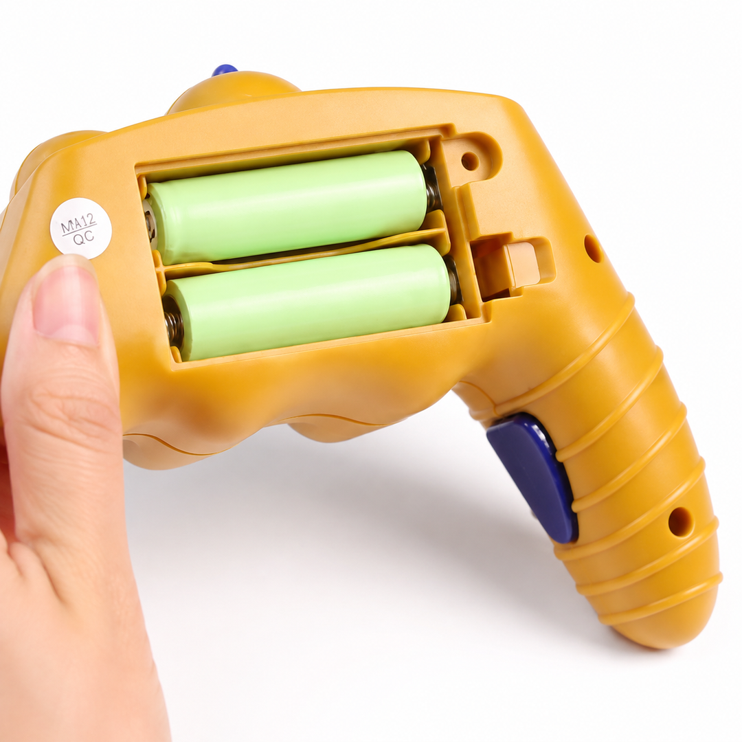 Back of the yellow remote controller showing its two-cell battery compartment.