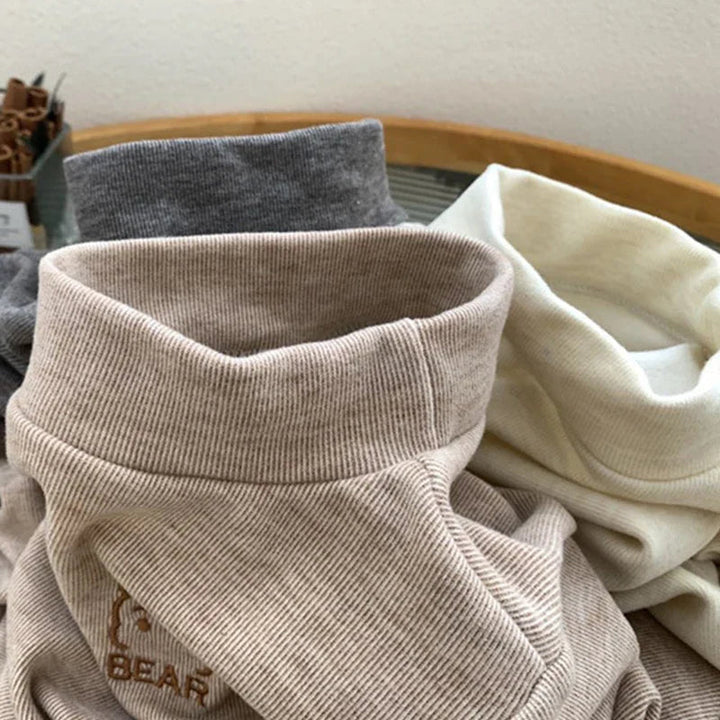 Ribbed high-neck collars on khaki, beige and dark gray shirts