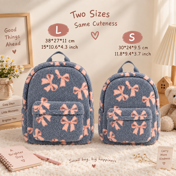 Small and large blue ribbon teddy backpacks with measurements in centimeters and inches