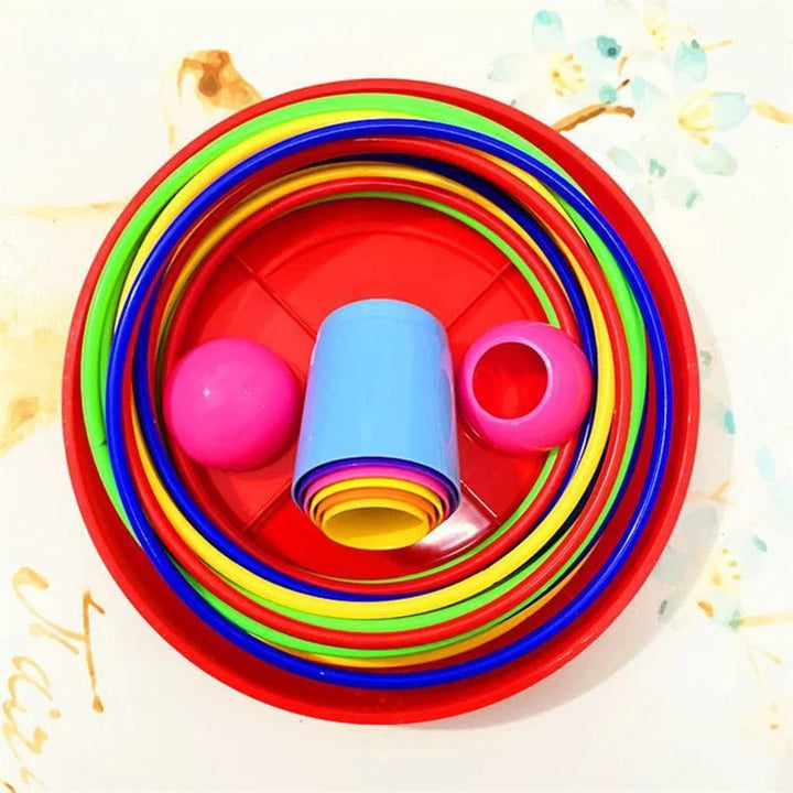 Colorful rings and nested tower cups packed into a round red base