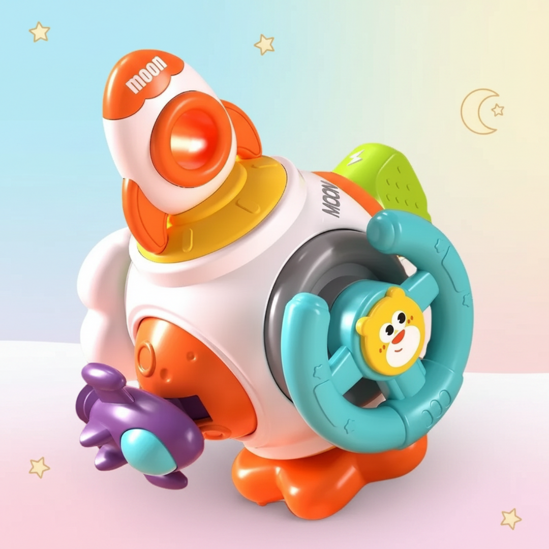Rocket activity toy with a teal steering wheel, orange rocket, and purple spaceship on a pastel background