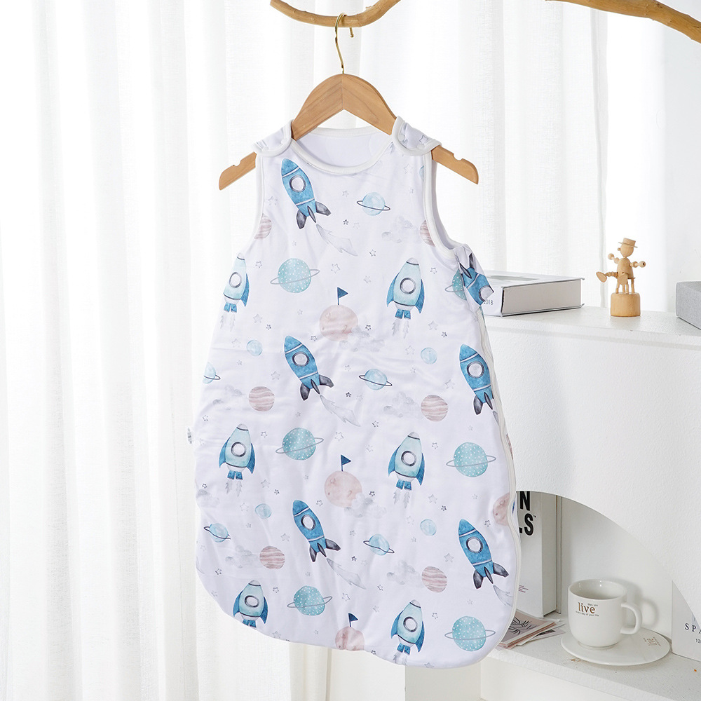 Sleeveless baby sleep sack with blue rockets, planets, and stars
