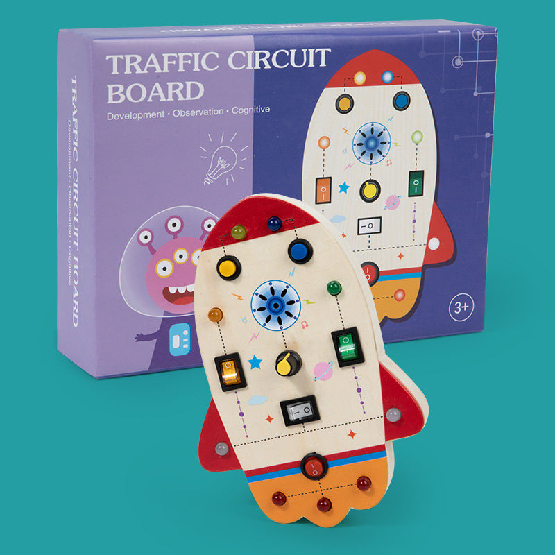 Rocket LED activity board beside a purple illustrated box