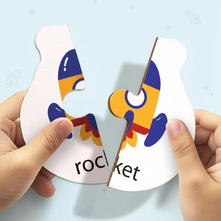 Hands joining two wooden puzzle halves to complete a rocket picture and word