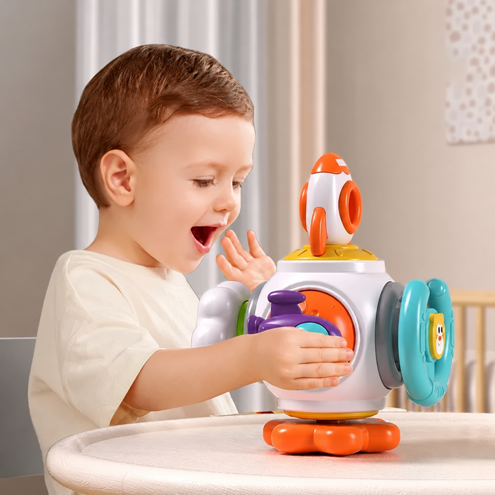 Child exploring the purple spaceship panel of a Rocket activity toy at a table