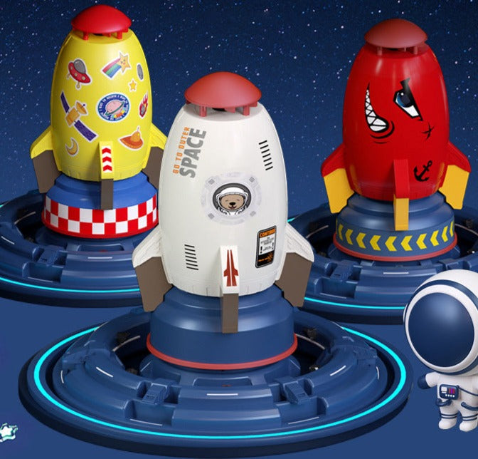 Yellow, white, and red rocket sprinklers displayed on round blue bases