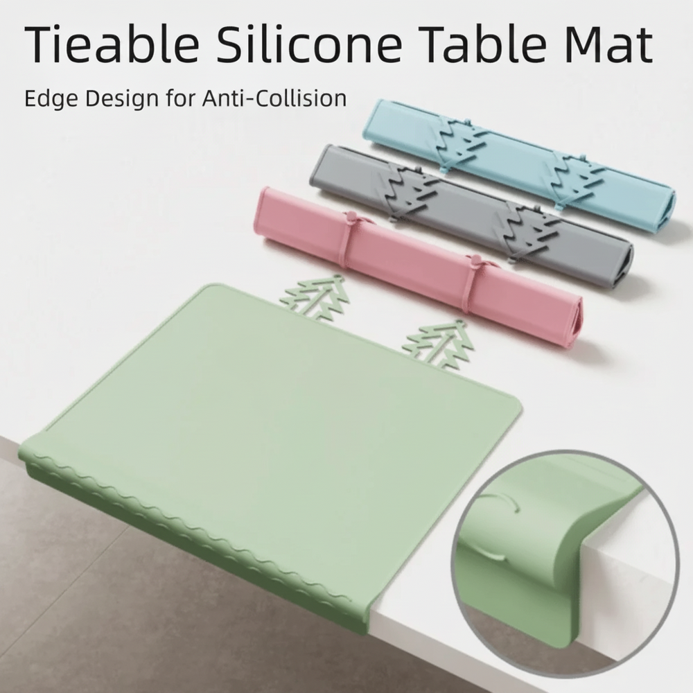 Green silicone placemat with rolled blue, gray, and pink mats and a table-edge detail