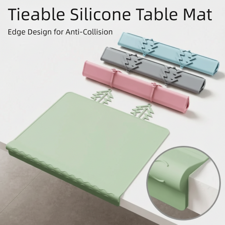 Green silicone placemat with rolled blue, gray, and pink mats and a table-edge detail
