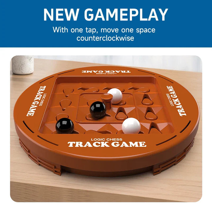 Rotating strategy board with black and white marbles in curved tracks
