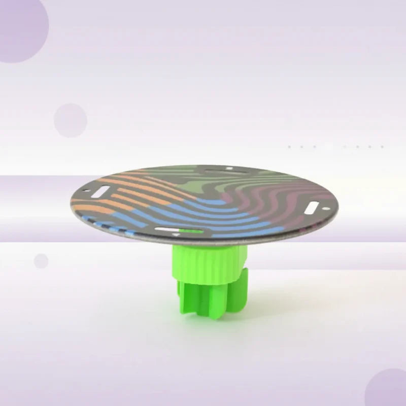 Round patterned balance disc mounted on a green bottle stopper.