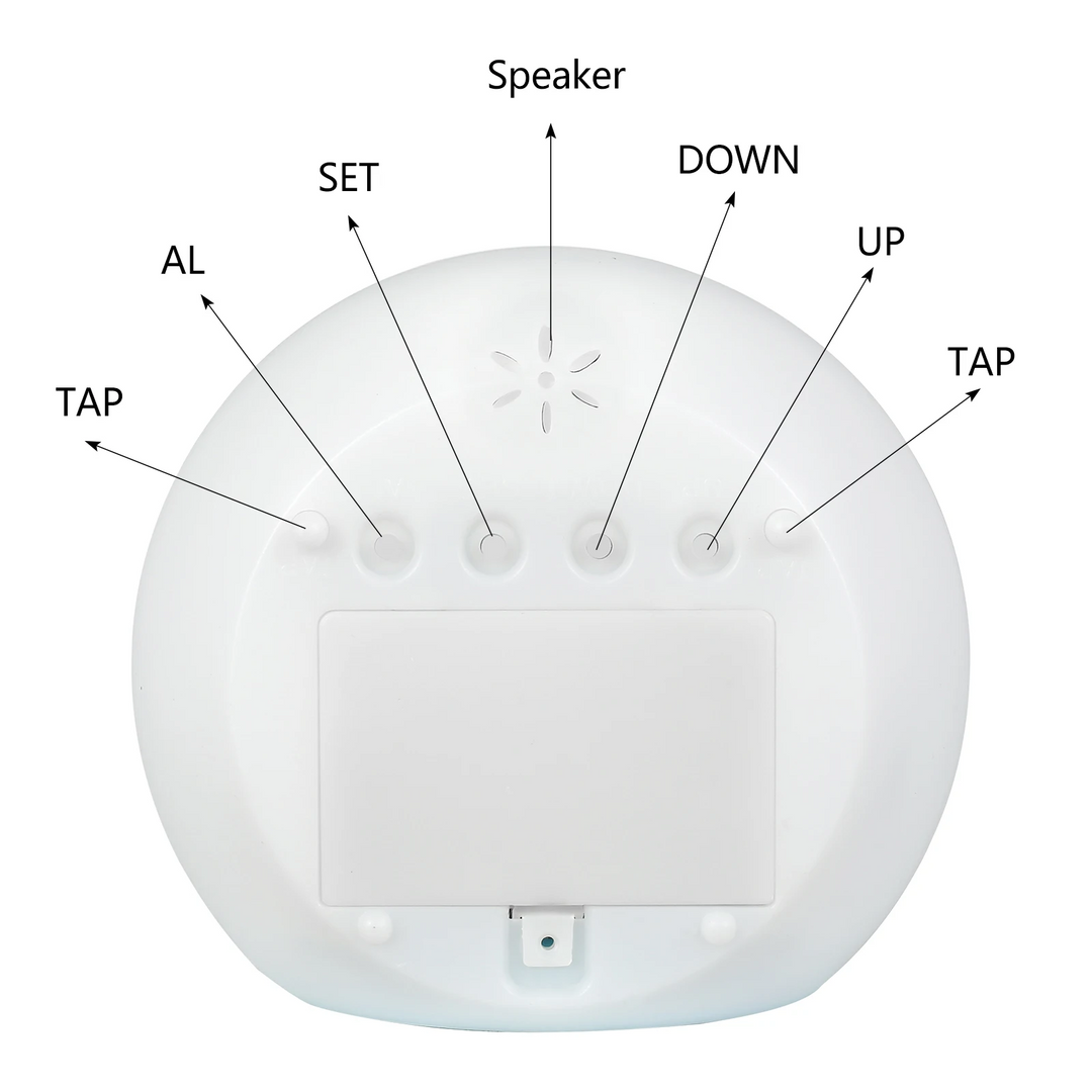 Labeled rear controls and speaker on the round digital alarm clock.