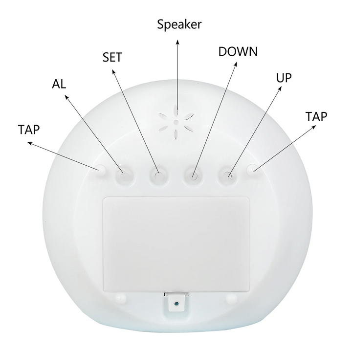 Labeled rear controls and speaker on the round digital alarm clock.