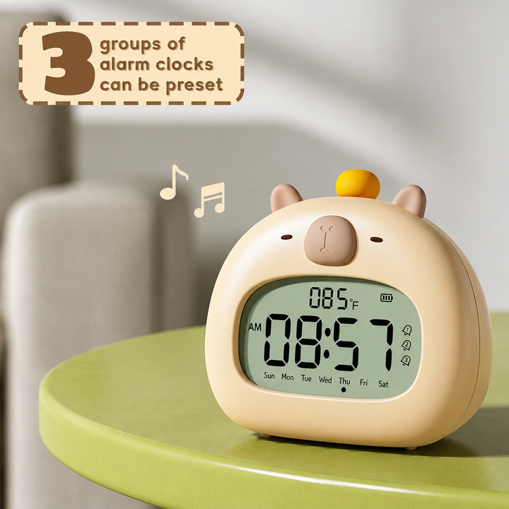 Rounded capybara digital alarm clock on a green side table with alarm-setting graphics.