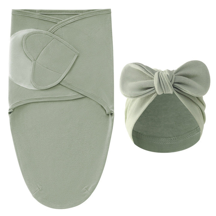 Sage green swaddle blanket and matching bow hat