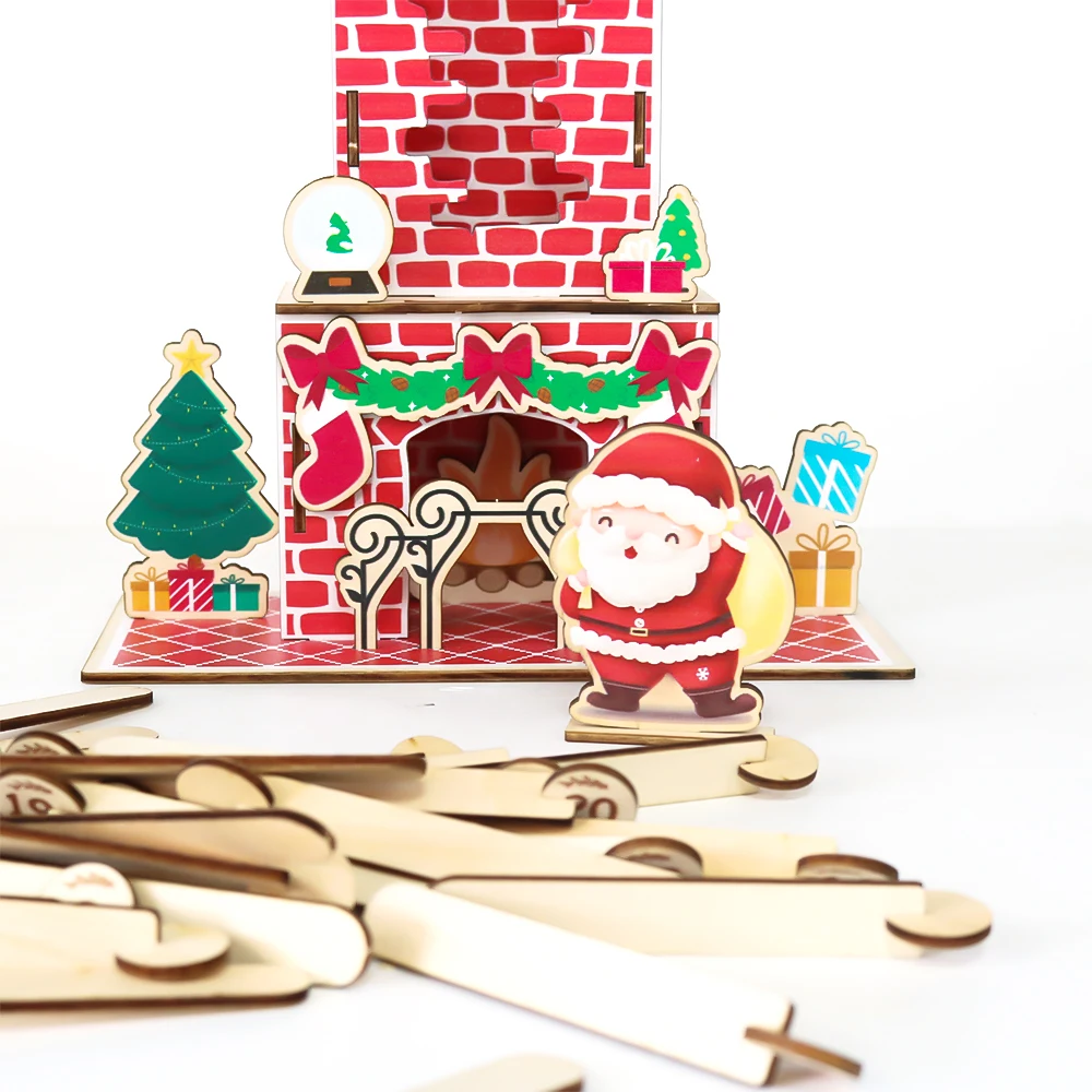 Santa figure beside the decorated fireplace base and loose wooden countdown pieces