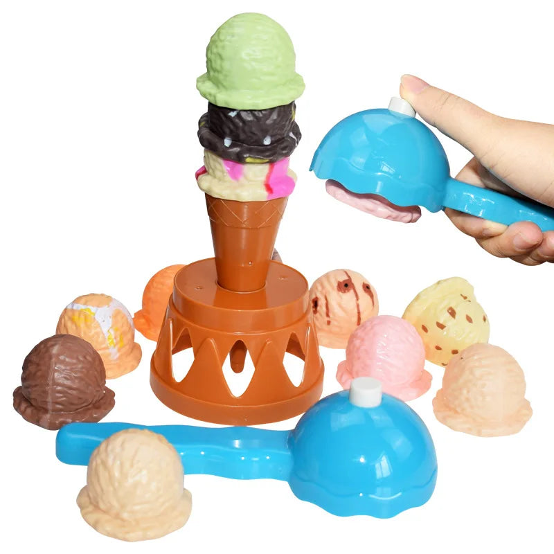 Hand using a blue scoop beside stacked ice cream pieces on a cone and orange stand