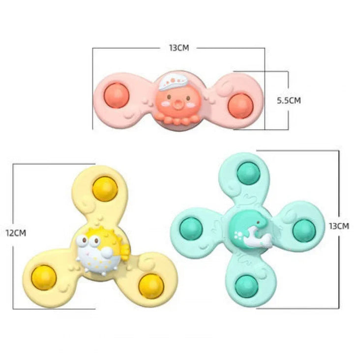 Size chart showing a 12 cm yellow spinner, 13 cm mint-green spinner and 13 x 5.5 cm pink spinner