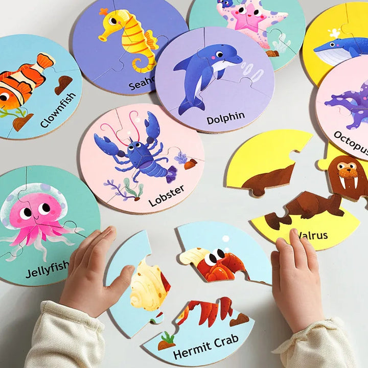 A child matching sea creature pieces beside completed round animal puzzles