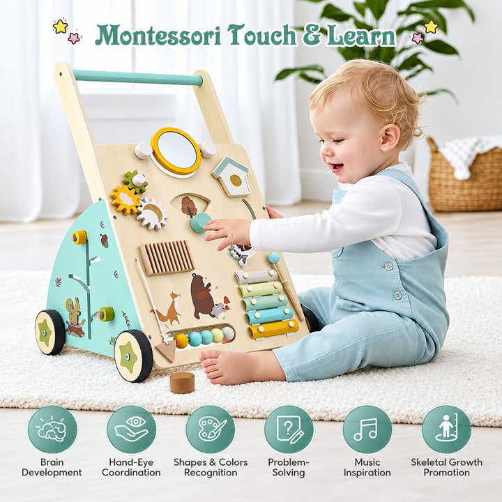 Seated child exploring the front activity panel of the wooden walker.