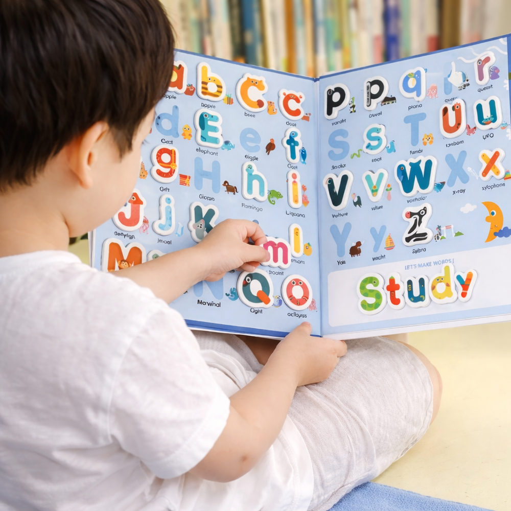 Child matching magnetic letters on an open alphabet learning book