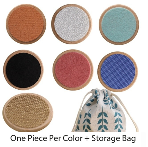 Seven differently colored texture discs and a drawstring storage bag shown as a complete set