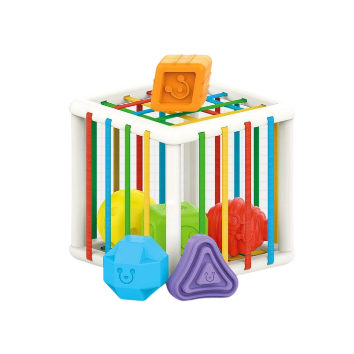 Shape sorter cube with an orange block on top and blue and purple blocks in front