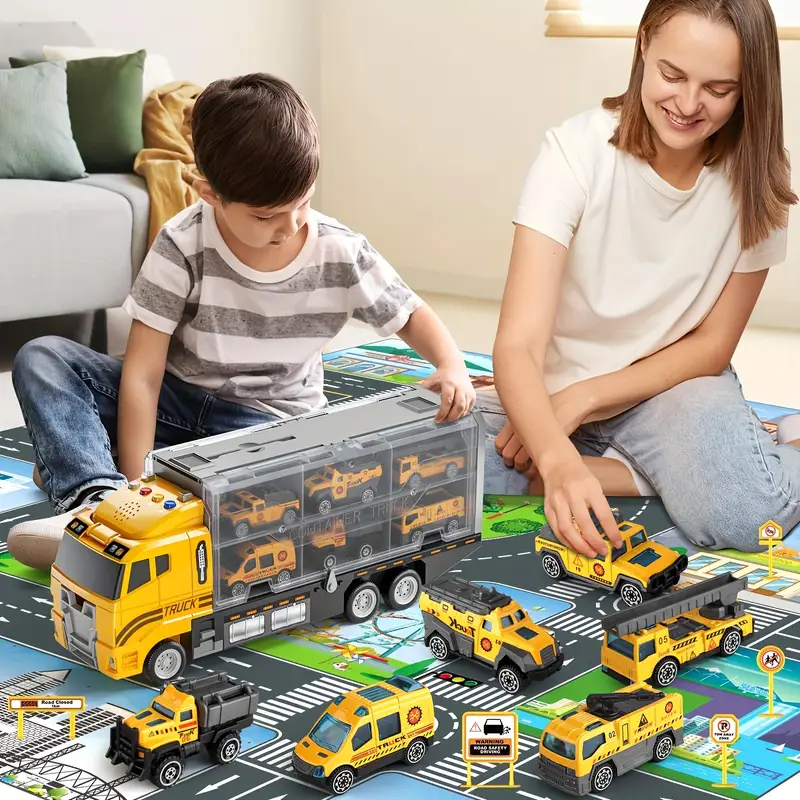 Child and adult playing with a yellow toy carrier and small vehicles on a road-pattern play mat.