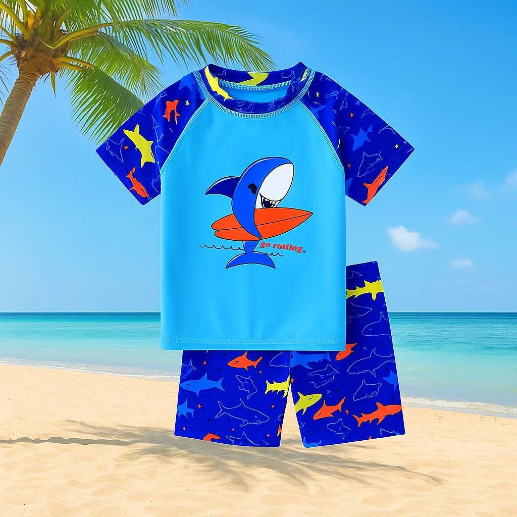 Blue shark swim shirt with short sleeves and coordinating shark-print shorts