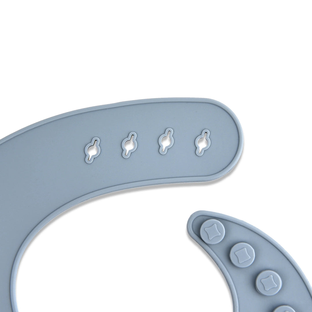 Close-up of a blue-gray silicone bib&