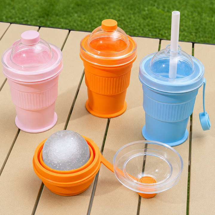 Pink, orange, and blue silicone cups shown expanded, with an orange cup folded beside its lid