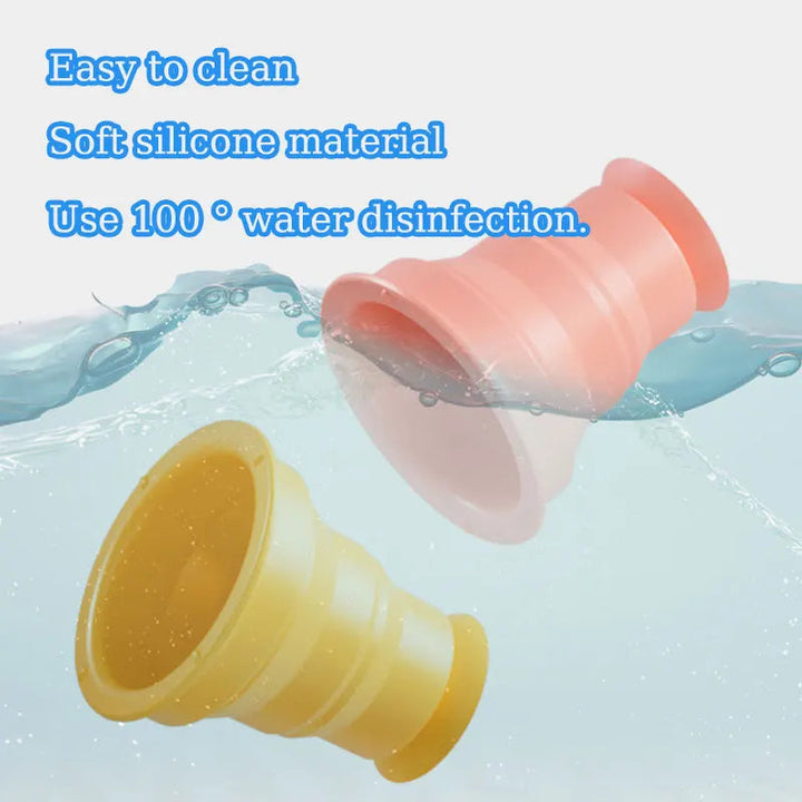 Pink and yellow silicone cups in water with cleaning instructions