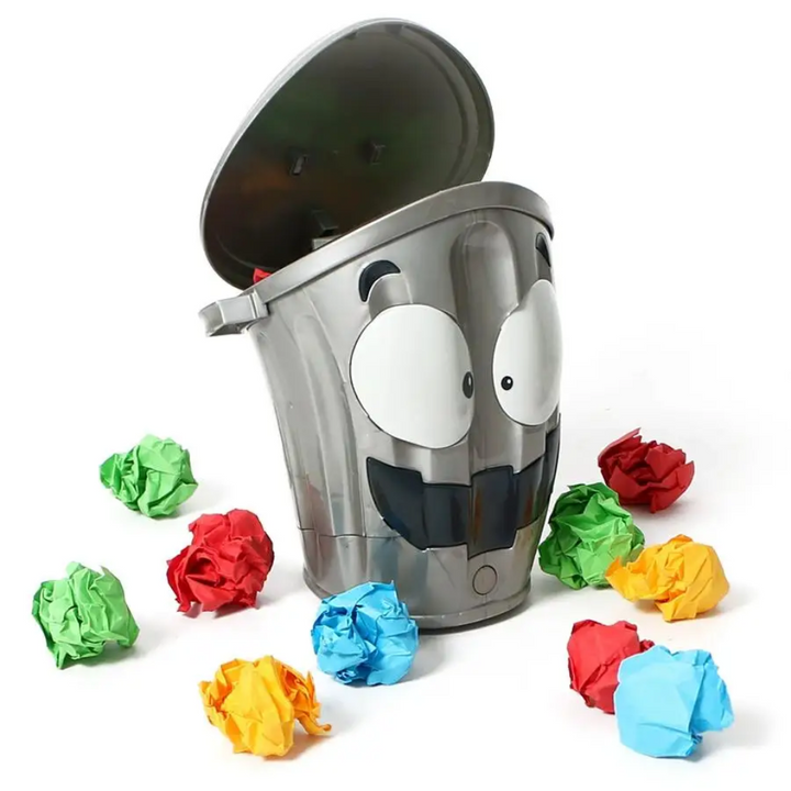 Gray cartoon trash can target with its lid open and colorful crumpled paper balls.