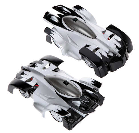 Two angled views of a silver-and-black remote-control stunt car