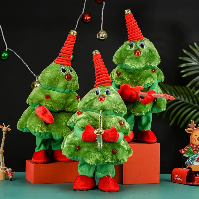 Three green plush Christmas tree toys with red hats arranged in a festive display.