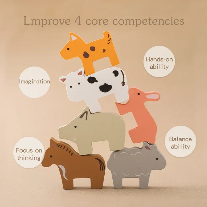 Six wooden animal figures stacked into a balancing tower.