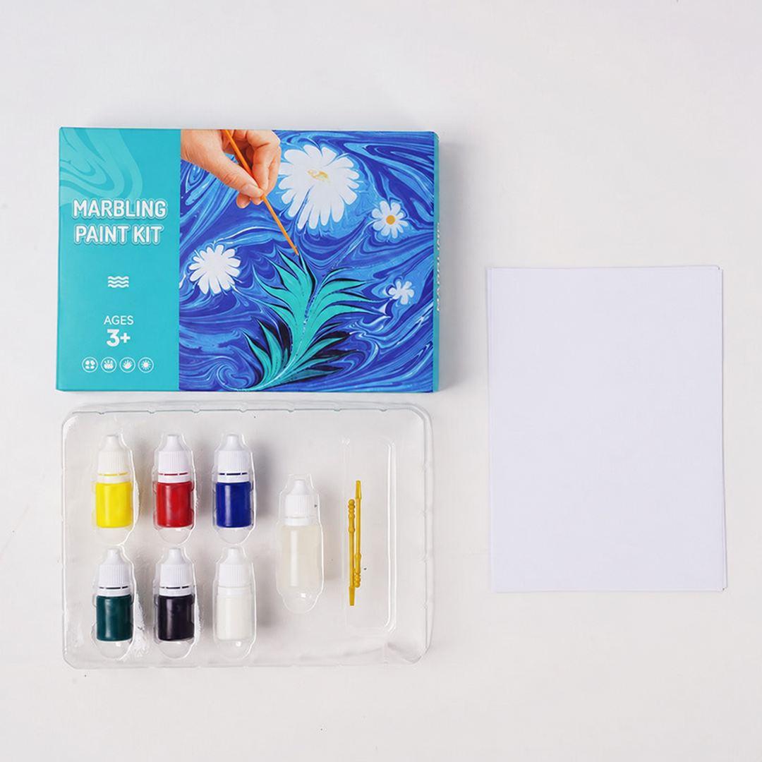 Six-color marbling kit with paint bottles, tools, paper, and a plastic tray