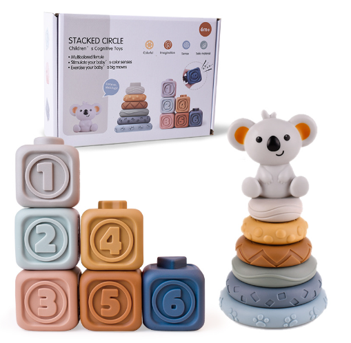 Six numbered cubes beside a koala-topped ring stack and product box