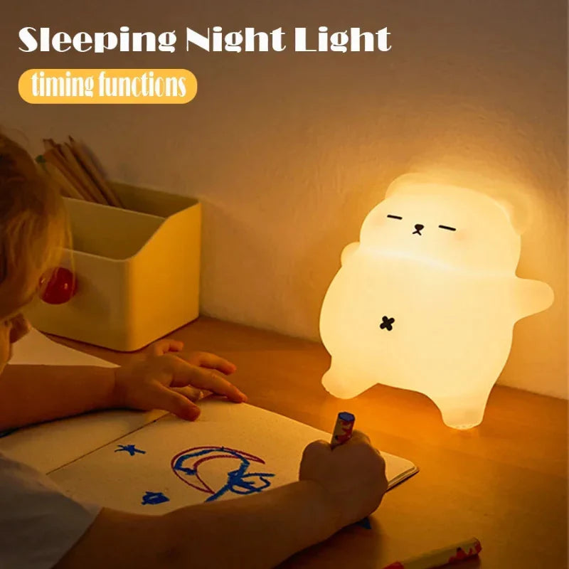Bear-shaped night light illuminating a child&
