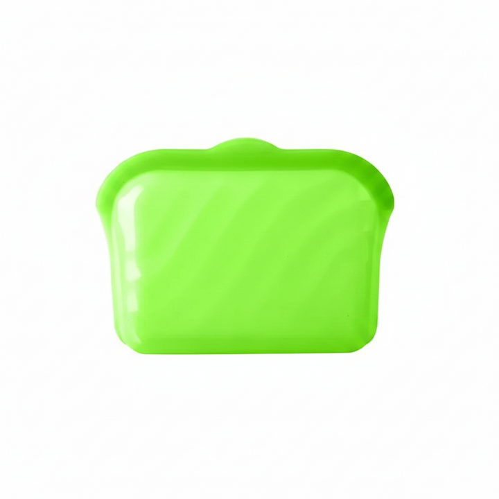 Small green silicone food storage bag with a closed top.