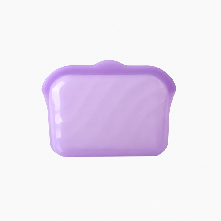 Small purple silicone food storage bag with a partially transparent body.