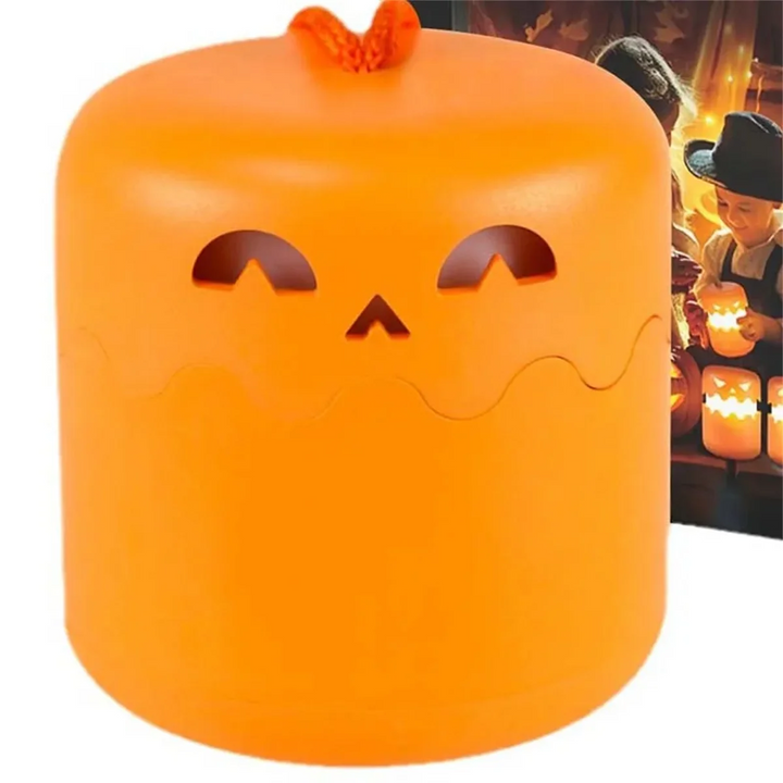 Close-up of an unlit orange pumpkin lantern with a smiling face and cord